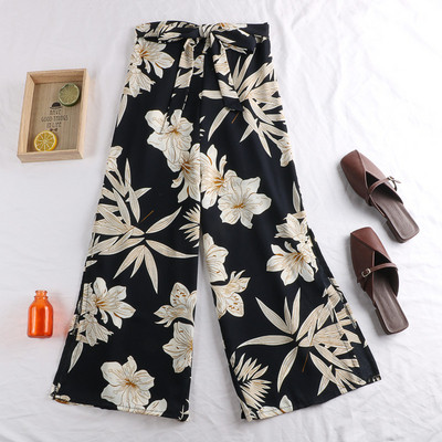 Pantaloni de dama actuali in trei culori cu motive florale