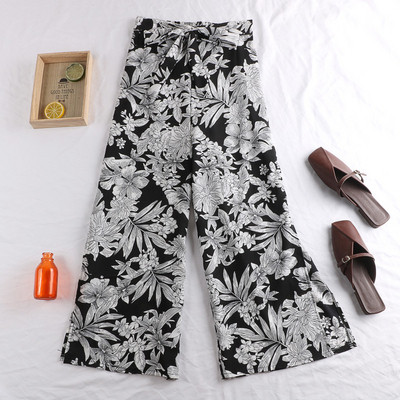 Pantaloni de dama actuali in trei culori cu motive florale