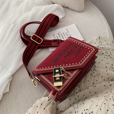 Geanta de dama cu element metalic si maner lung