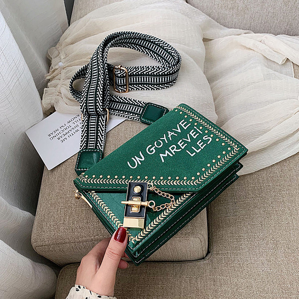 Geanta de dama cu element metalic si maner lung