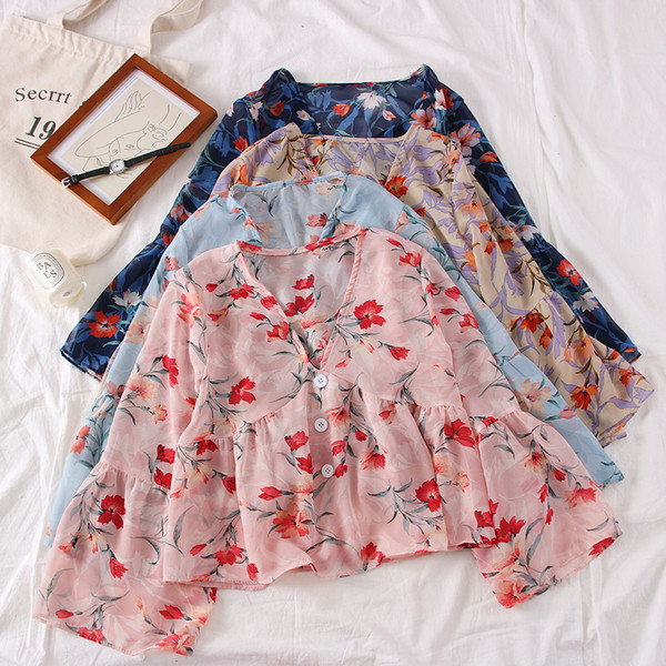 Bluză de damă elegantă cu motive florale