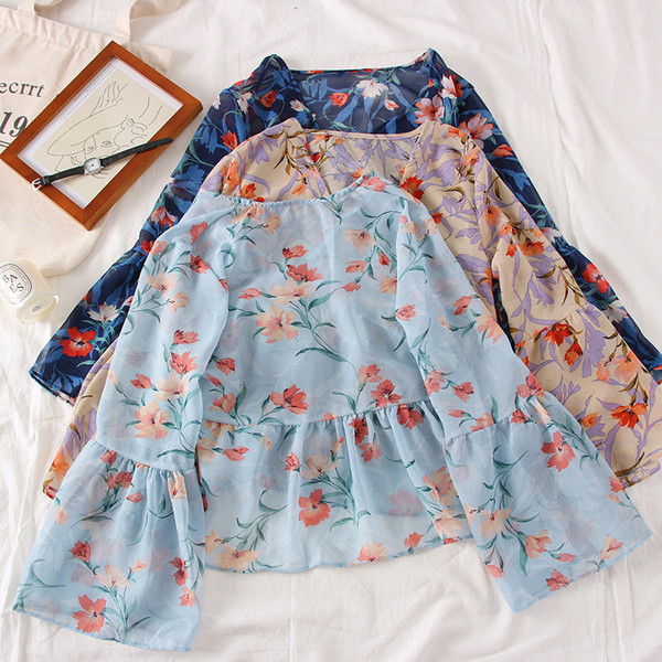 Bluză de damă elegantă cu motive florale