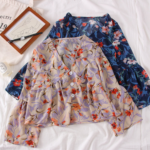 Bluză de damă elegantă cu motive florale