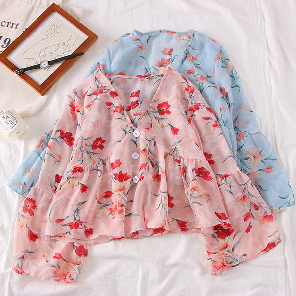 Bluză de damă elegantă cu motive florale