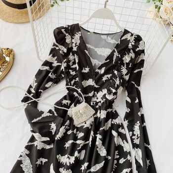 Rochie modernă de damă cu mâneci lungi și decolteu adânc de culoare neagră