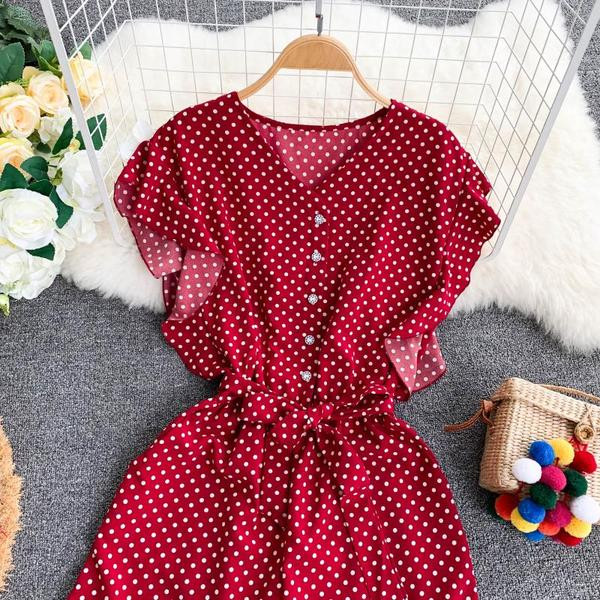 Salopetă de damă modernă cu puncte în albastru, alb și roșu