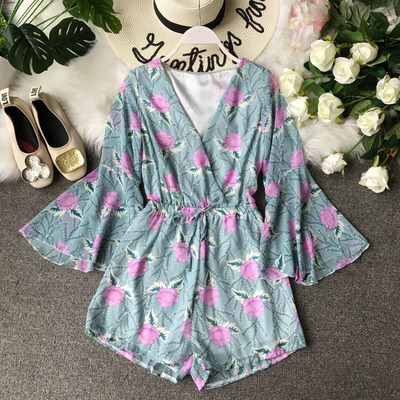 Salopeta de dama actuala cu maneci lungi si model floral