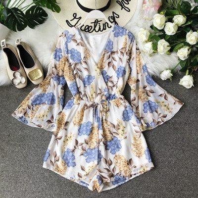 Salopeta de dama actuala cu maneci lungi si model floral