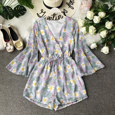 Salopeta de dama actuala cu maneci lungi si model floral