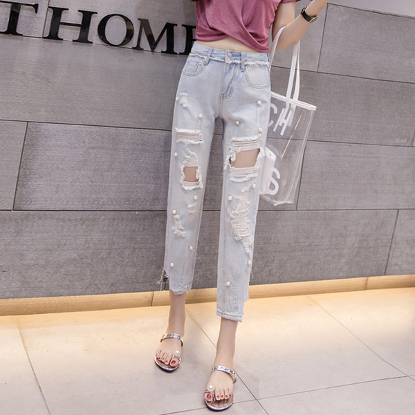 Blugi de dama actuali in culoare deschisa cu perle decorative