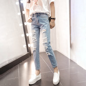 Blugi de dama actuali cu talie standard si motive rupte