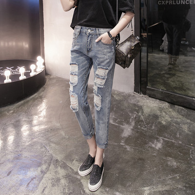 Blugi moderni de dama cu talie standard si motive rupte