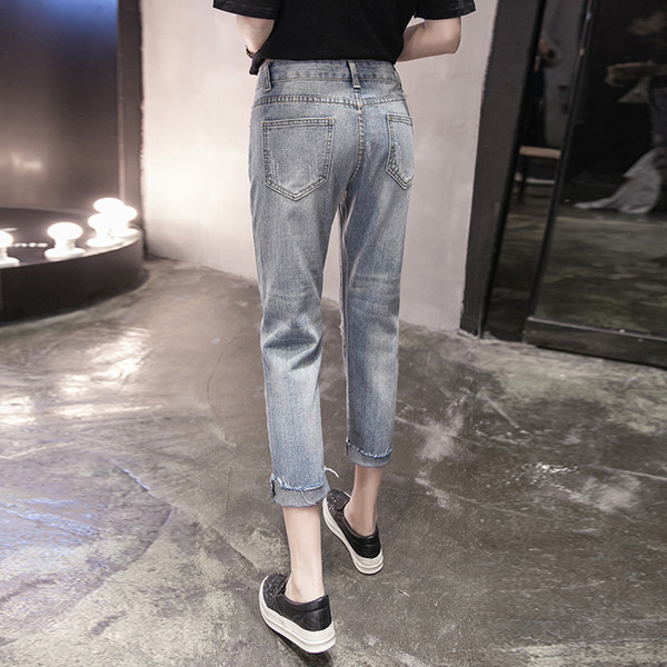 Blugi moderni de dama cu talie standard si motive rupte