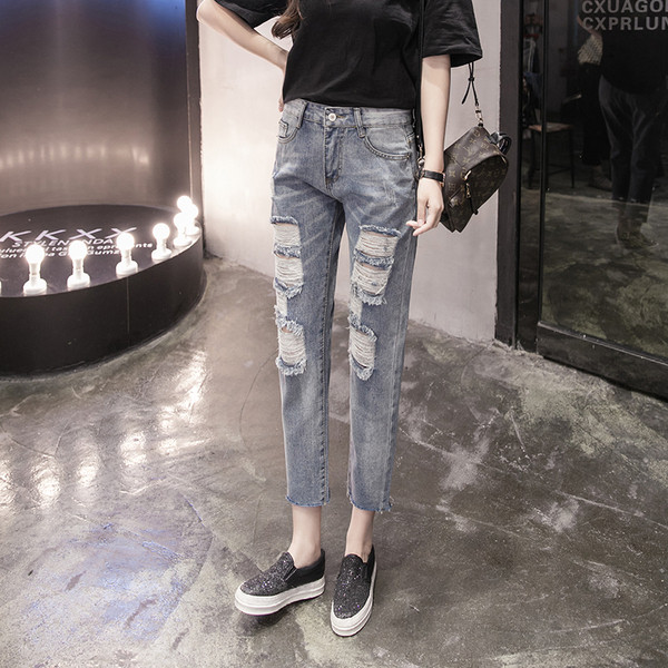 Blugi moderni de dama cu talie standard si motive rupte