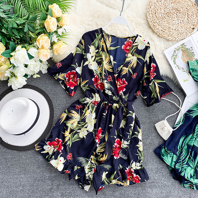 Salopetă elegantă de damă cu model floral și mâneci scurte