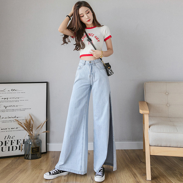 Актуална дамски дънки - широк модел с цепка