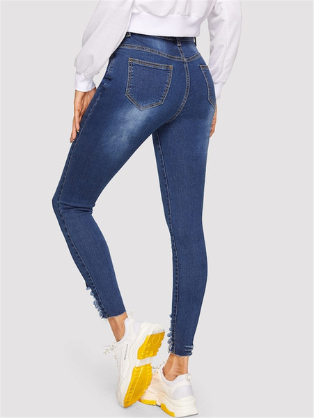 Blugi de dama moderni cu talie inalta si motive rupte in albastru