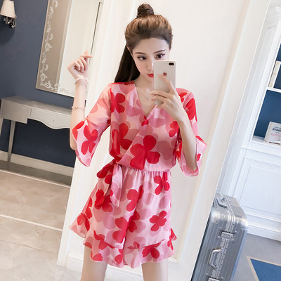 Salopeta de dama moderna cu model floral cu maneci 3/4