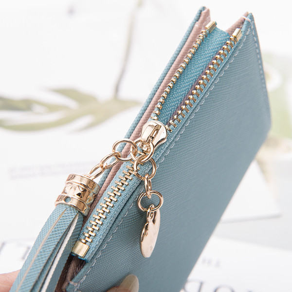 Geanta de dama moderna cu element de agatat metalic in mai multe culori