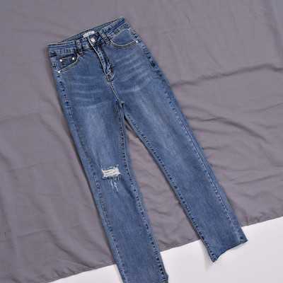 Blugi moderni de dama cu talie inalta si motiv rupt in albastru si negru