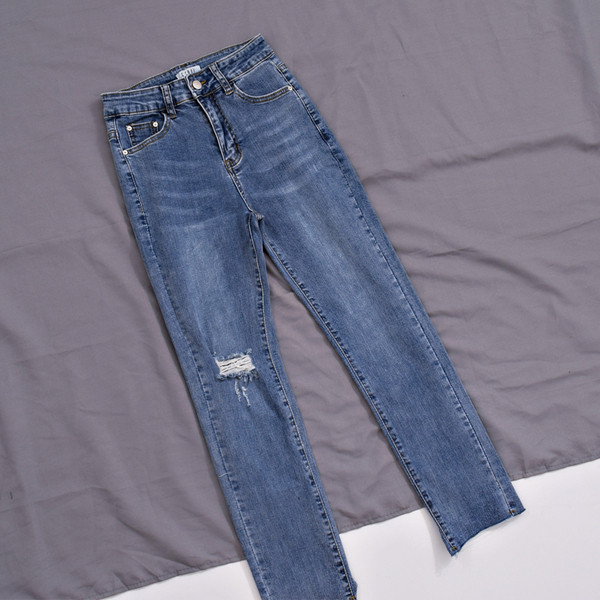 Blugi moderni de dama cu talie inalta si motiv rupt in albastru si negru