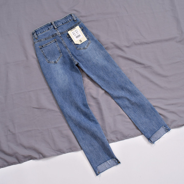 Blugi moderni de dama cu talie inalta si motiv rupt in albastru si negru