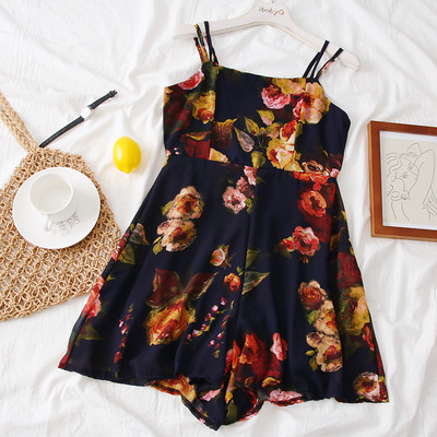 Salopeta de dama de culoare neagra cu motive florale