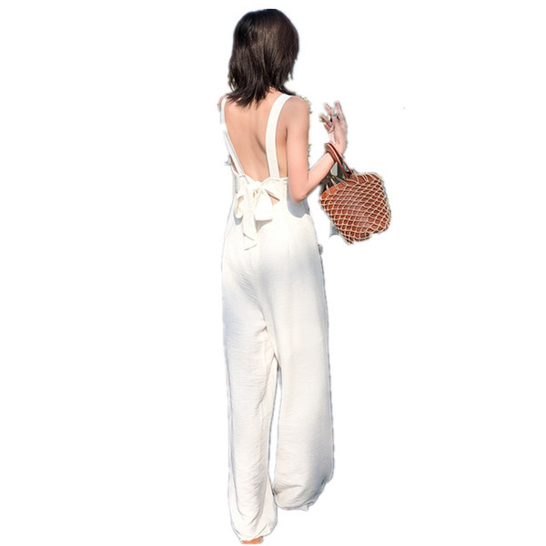 Salopetă elegantă de damă în alb