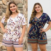 Salopetă casual de damă cu decolteu în V în albastru și alb