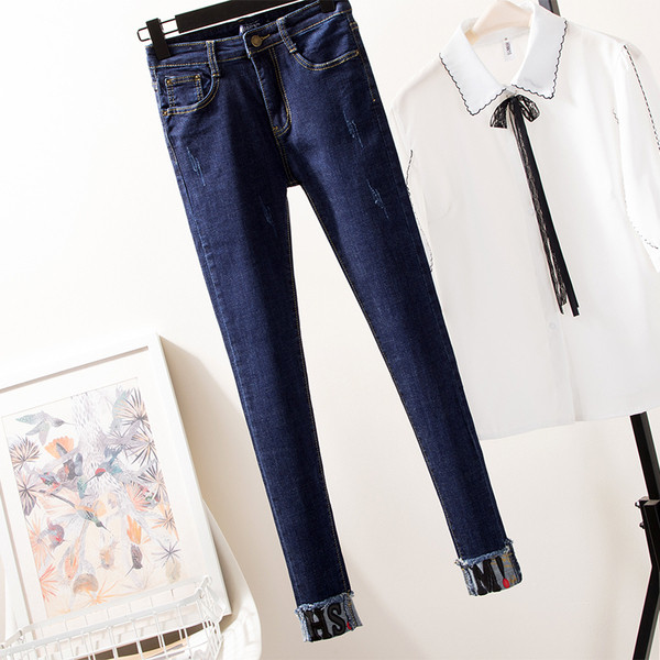 Blugi moderni de dama in albastru inchis cu inscriptii