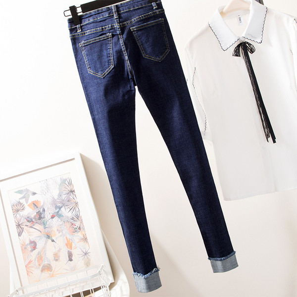 Blugi moderni de dama in albastru inchis cu inscriptii