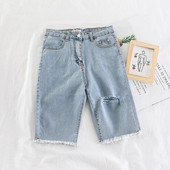 Blugi de dama model nou 3/4 cu motive rupte in albastru