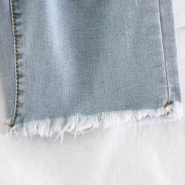 Blugi de dama model nou 3/4 cu motive rupte in albastru