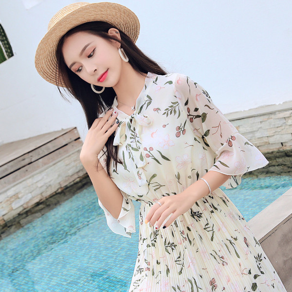 Rochie de dama eleganta cu model floral si talie inalta