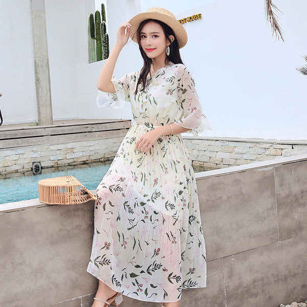 Rochie de dama eleganta cu model floral si talie inalta