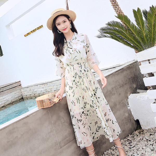 Rochie de dama eleganta cu model floral si talie inalta