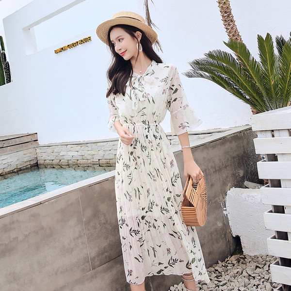 Rochie de dama eleganta cu model floral si talie inalta