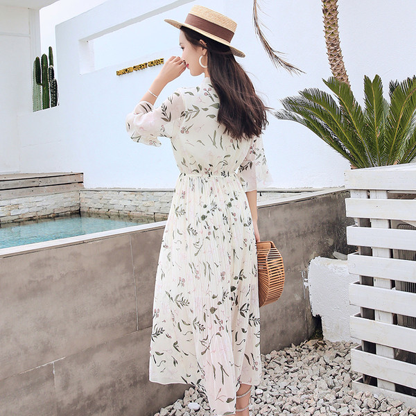 Rochie de dama eleganta cu model floral si talie inalta