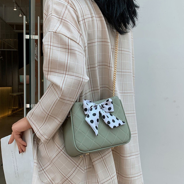 Geanta de dama moderna cu panglica si maner lung