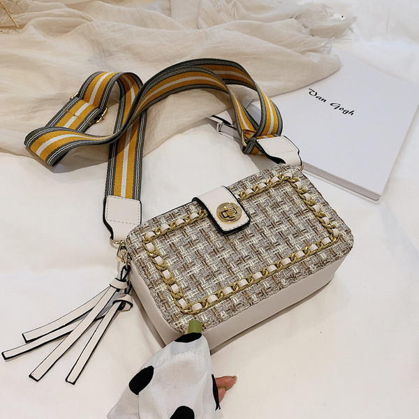 Geanta de dama cu inchidere metalica in patru culori