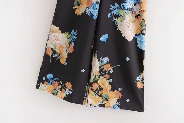 Salopeta de dama cu model floral in negru