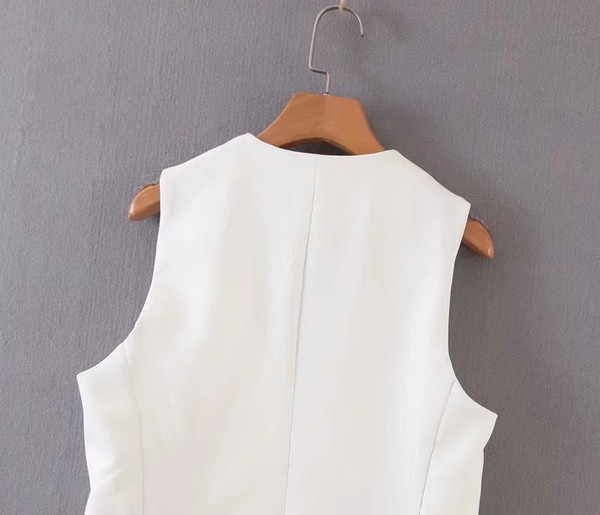 Vestă elegantă de damă cu buzunar alb