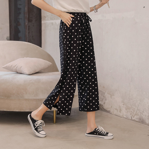 Pantaloni casual de damă cu buline în negru