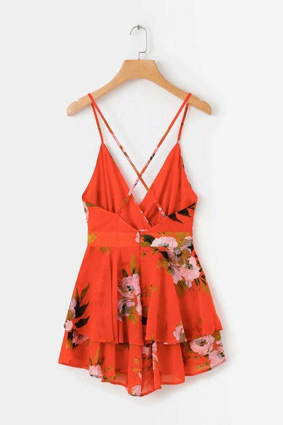 Salopetă de damă elegantă, cu decolteu în V adânc