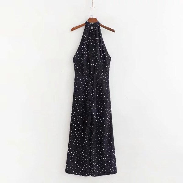 Salopetă de damă modernă cu puncte negre