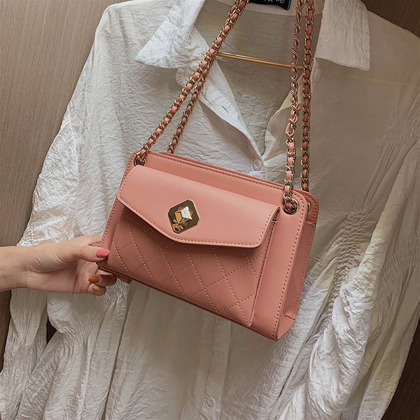 Geanta de dama cu inchidere metalica in patru culori