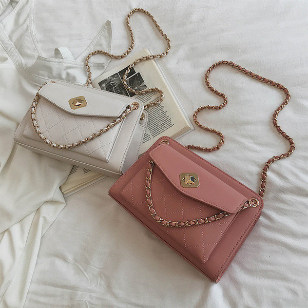 Geanta de dama cu inchidere metalica in patru culori