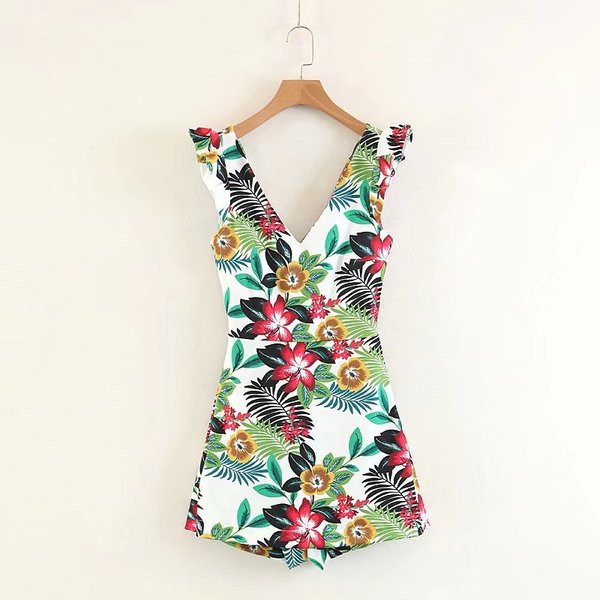 Salopetă de damă elegantă, cu decolteu în V și model floral