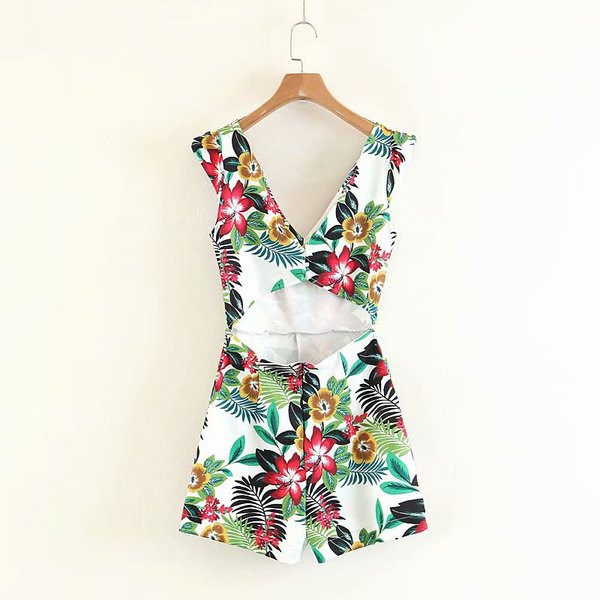 Salopetă de damă elegantă, cu decolteu în V și model floral