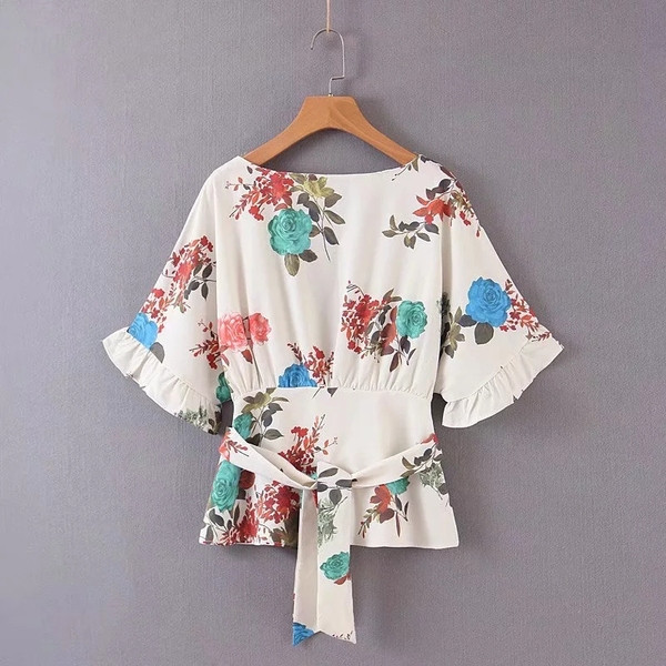 Bluză de damă cu mâneci scurte și model floral